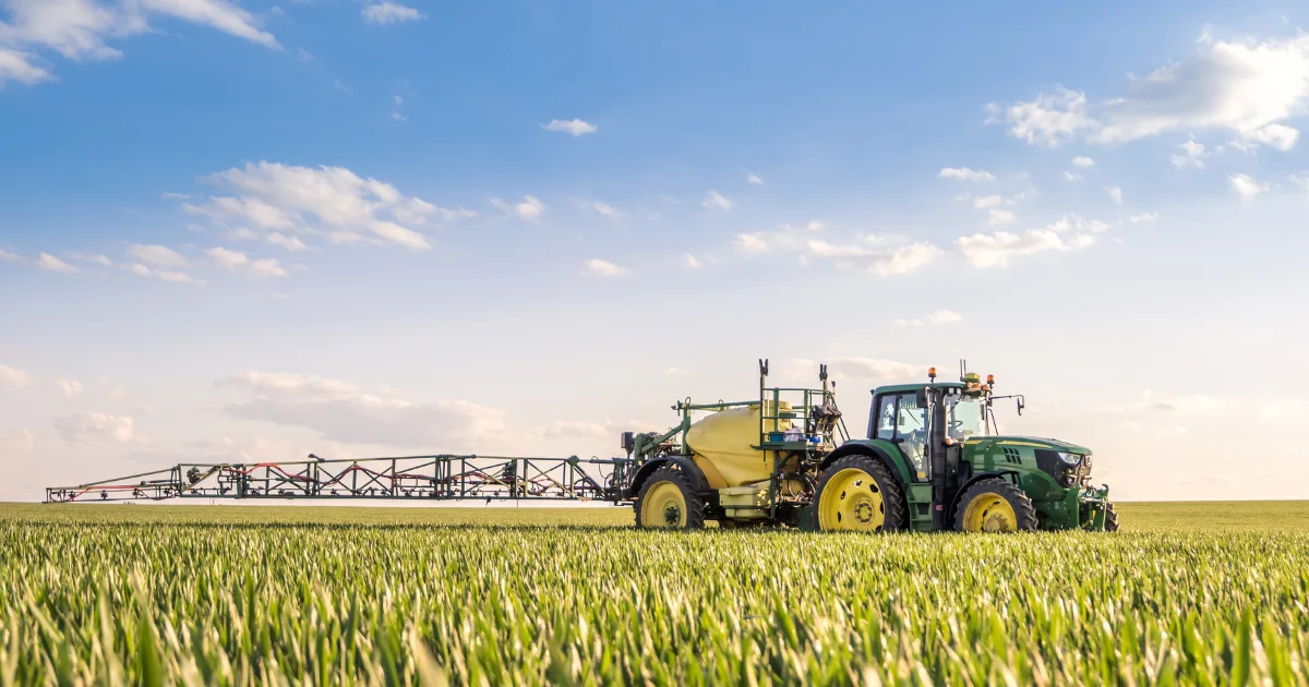 an image showing a tractor on a farm
