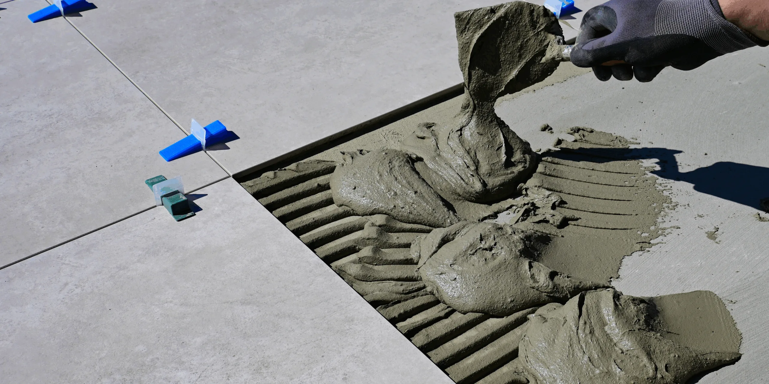 an image showing concrete under tiles