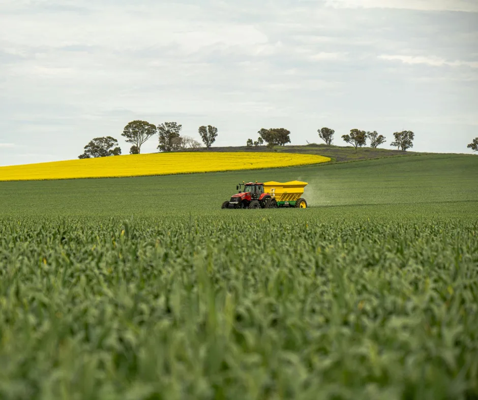 an image to show fertiliser being spread across a field